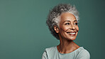 Radiant mature senior model woman with grey hair laughing and smiling for spa and dental