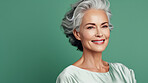 Radiant mature senior model woman with grey hair laughing and smiling for spa and dental