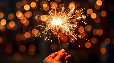 Buy stock photo Hand holding sparkler. Festive Christmas, New Year, or birthday celebration concept