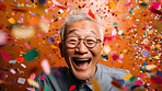 Happy laughing man with falling confetti. Celebration party event, corporate win