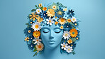 World mental health awareness day. Paper cutout woman head  and flowers blue background