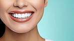 Closeup of woman with a beautiful smile for dental care against a blue background