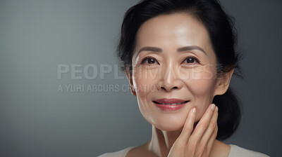 Radiant mature senior model woman smiling for spa beauty and skincare in studio