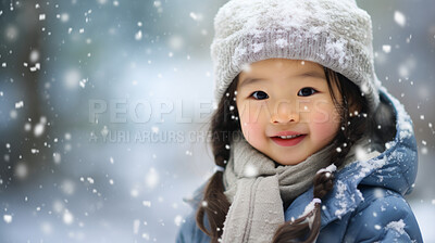 Buy stock photo Portrait of an Asian toddler girl enjoying the winter snow during the Christmas season