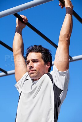 Buy stock photo Man, fitness and pull ups on monkey bars in park gym for weightlifting, exercise or workout in nature. Fit, active and strong male lifting body weight or hanging on iron bar for strength exercising