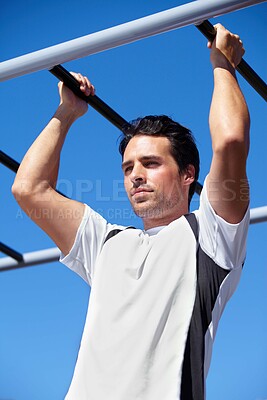 Buy stock photo Man, fitness and pull ups on monkey bars in nature, park or outdoor gym for weightlifting, exercise or workout. Fit, active and strong male lifting body weight or hanging on iron bar for exercising