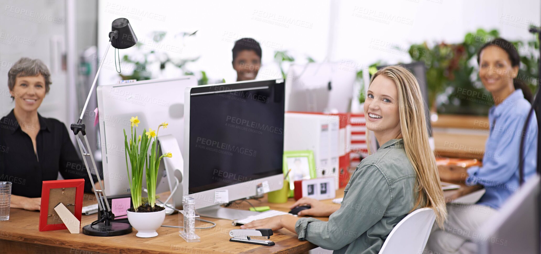 Buy stock photo Portrait of a group of female designers working in an office