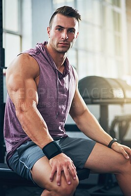 Buy stock photo Portrait of a muscular young man sitting in a gym