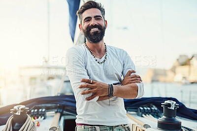 Buy stock photo Cropped shot of a handsome mature man on his yacht