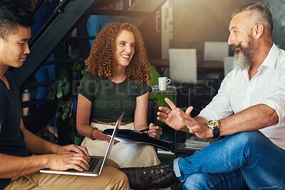 Buy stock photo Cropped shot of three creative businesspeople meeting in their office