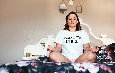 Buy stock photo Shot of a beautiful young woman practising yoga at home