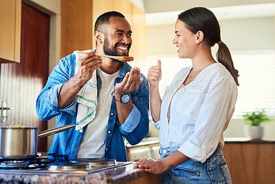 Buy stock photo Shot of a couple cooking together at home