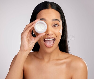 Buy stock photo Happy woman, face and skincare cream in cosmetics, beauty or product against a grey studio background. Portrait of female person with SPF lotion, creme or cosmetic moisturizer for facial treatment