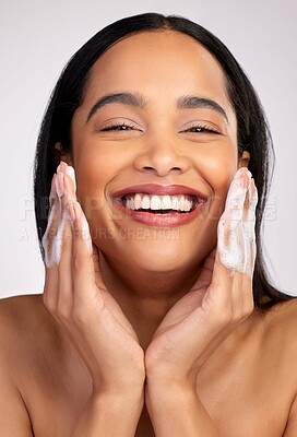 Buy stock photo Happy woman, portrait and soap in face wash for skincare hygiene, cleaning or dermatology against a grey studio background. Female person with smile for clean facial treatment, self care or love
