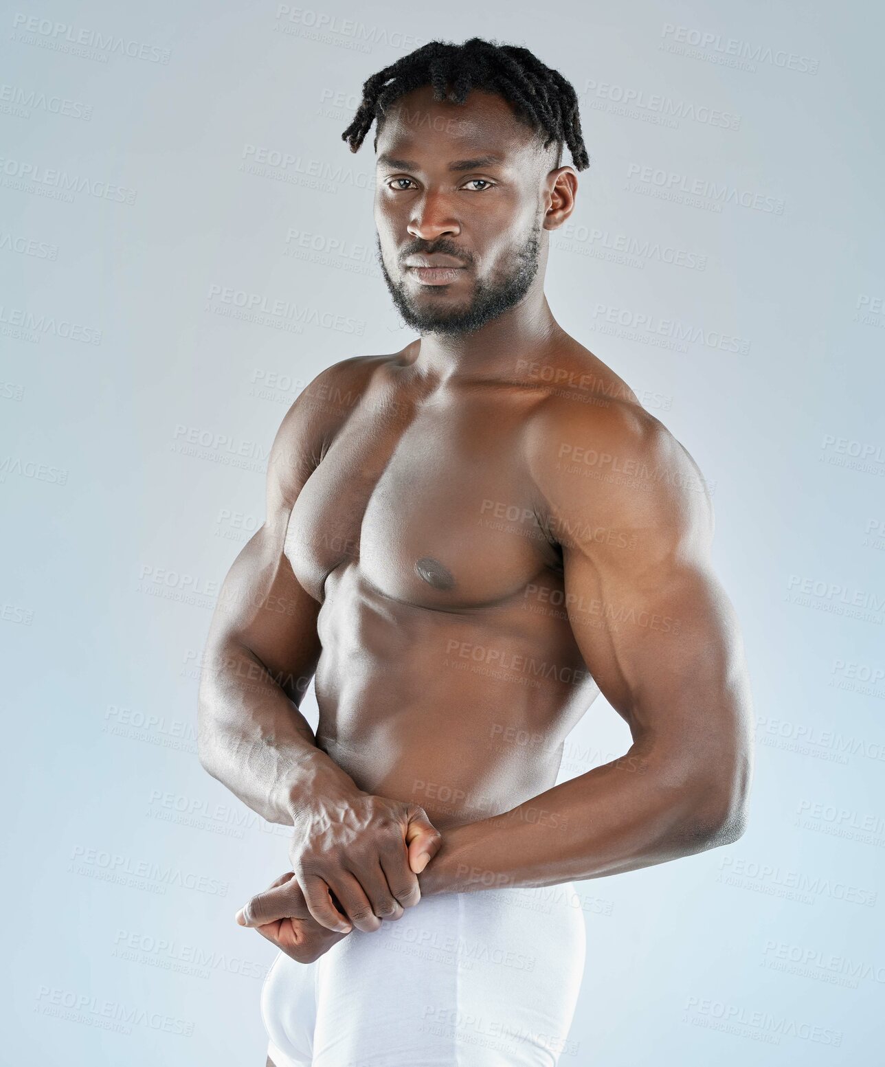 Buy stock photo Portrait, fitness and black man flexing, muscle and exercise against a studio background. Face, male person and model shirtless, workout goal or muscular guy with confidence, wellness or bodybuilding