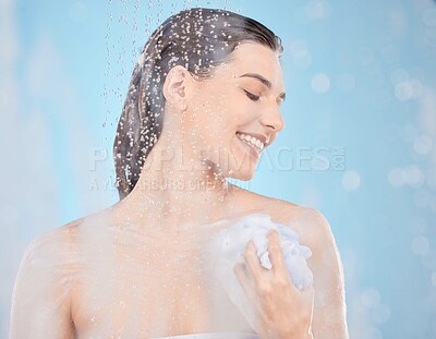 Buy stock photo Shower, cleaning and woman with water splash for washing, body care and hygiene on blue background. Skincare, wellness and girl relax in bathroom with beauty splash, foam and product for skin health