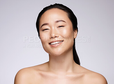 Buy stock photo Portrait, beauty and skincare with a model asian woman in studio on a gray background for natural face treatment. Microblading, facial or wellness with an attractive young female posing for skin care
