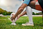 Rugby, hands and man ready to ball to score goal on field at game, match or practice workout. Sports, fitness and motion, player running to kick at poles on grass with energy and skill in team sport.
