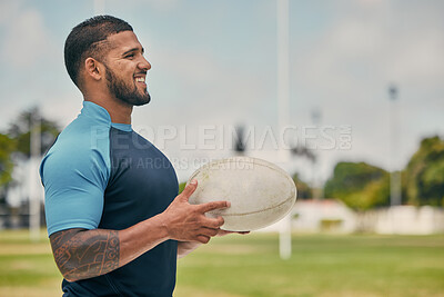 Buy stock photo Rugby, field and happy man with ball, confidence and pride in winning competition game. Fitness, sports and happiness, professional player with smile, ready for match and workout on grass at stadium.
