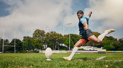 Buy stock photo Rugby, action and man kicking ball to score goal on field at game, match or practice workout. Sports, fitness and motion, player running to kick at poles on grass with energy and skill in team sport.