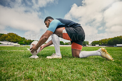 Buy stock photo Rugby kick, sports man or ball in training game, practice workout or match on stadium field outdoors. Fitness, ready or athlete player in action playing in cardio exercise on grass in France, Paris 
