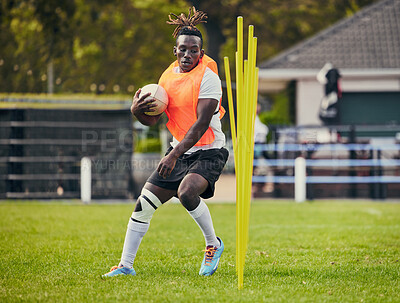 Buy stock photo Rugby, sports and black man training with equipment ready for match, practice and sport games. Fitness, performance and serious male athlete running for warm up, exercise and workout for competition