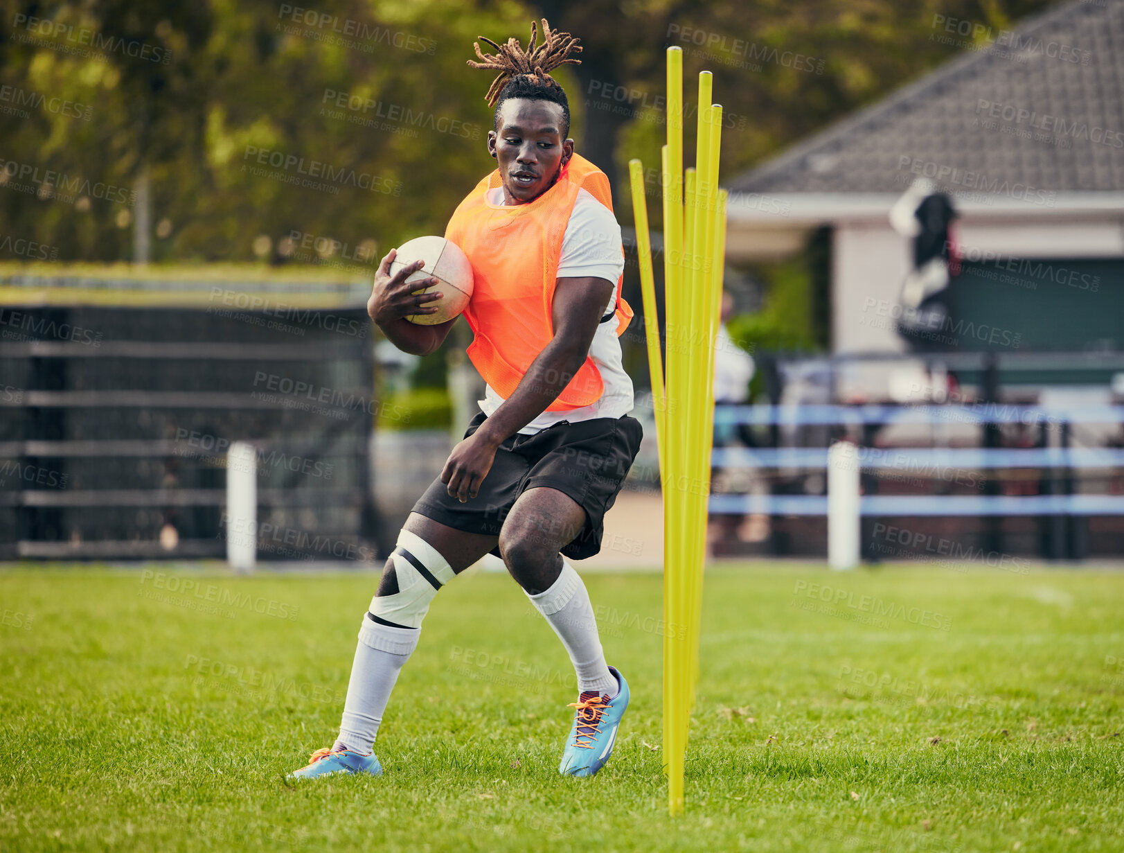 Buy stock photo Rugby, sports and black man training with equipment ready for match, practice and sport games. Fitness, performance and serious male athlete running for warm up, exercise and workout for competition