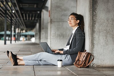 Buy stock photo Thinking, laptop and woman on a coffee break in the city or employee typing on social media, internet or online job search. Unemployed, worker and networking on computer for hiring opportunity