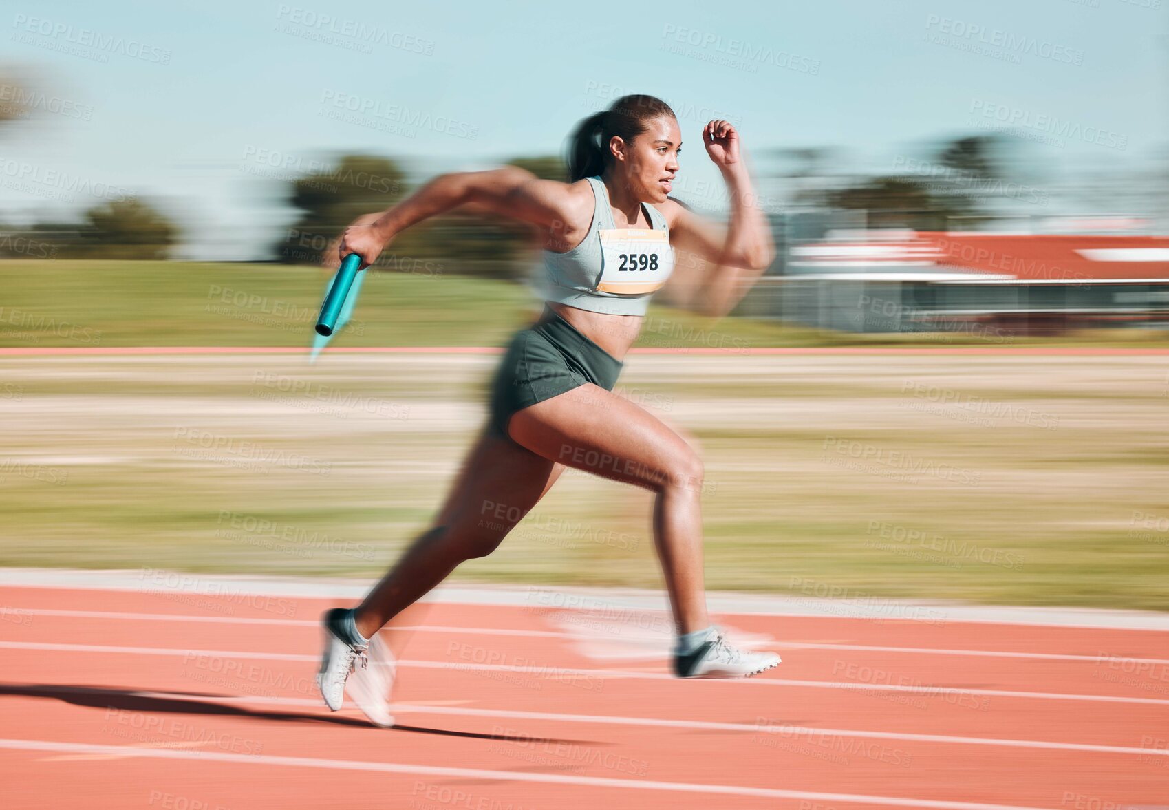 Buy stock photo Fast, race and athlete running relay sprint in competition or fitness game or training for energy wellness on a track. Sports, stadium and athletic person or runner exercise, speed and workout