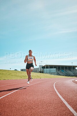 Buy stock photo Woman, athlete and running on stadium track in fitness, workout or cardio exercise for practice or training. Female person or runner in sports competition, performance or outdoor motivation on mockup