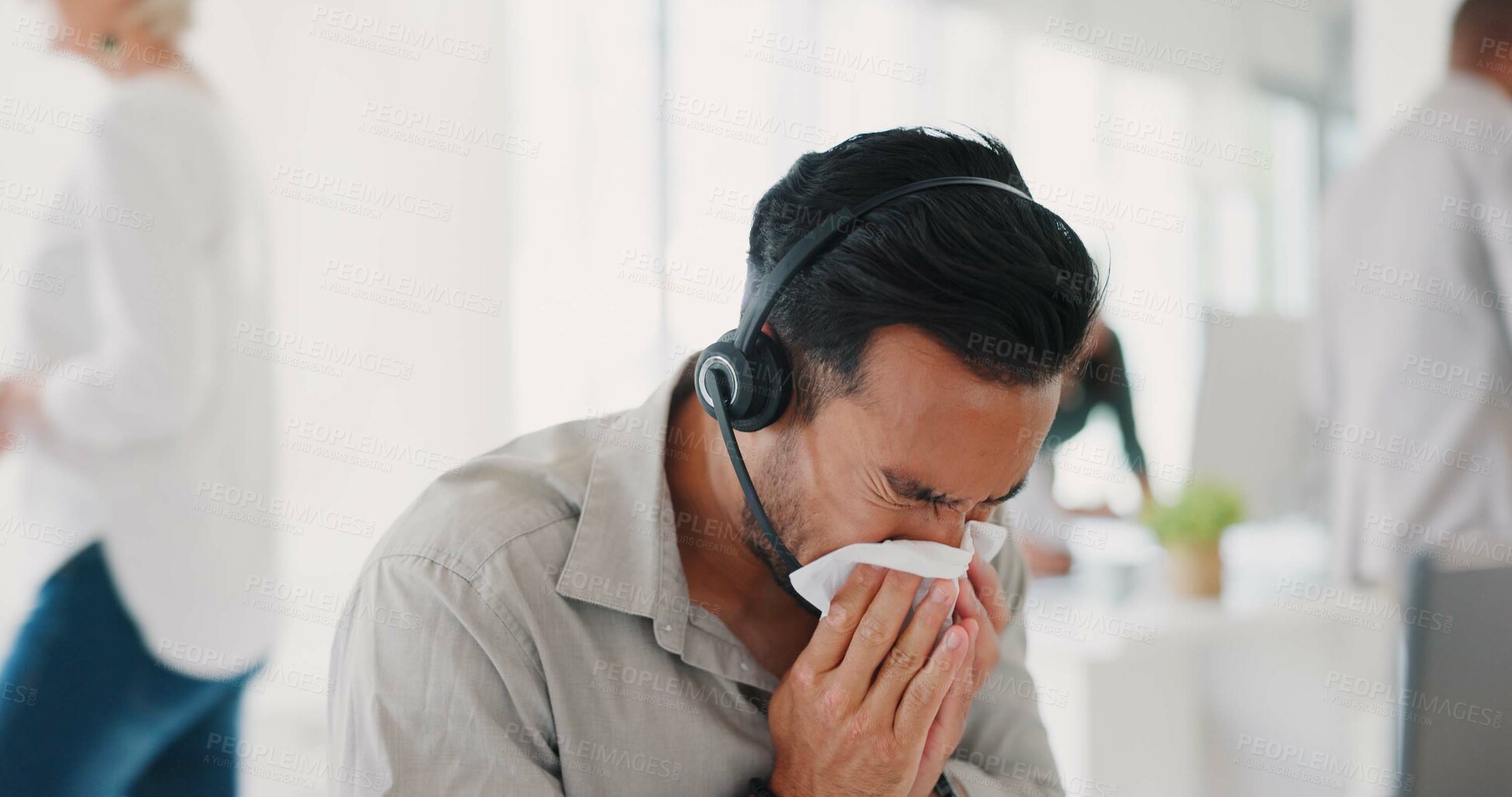 Buy stock photo Call center man, sneeze and sick in office, tissue or healthcare with headphone mic for telemarketing job. Agent guy, consultant or customer service employee with toilet paper for blowing nose at job