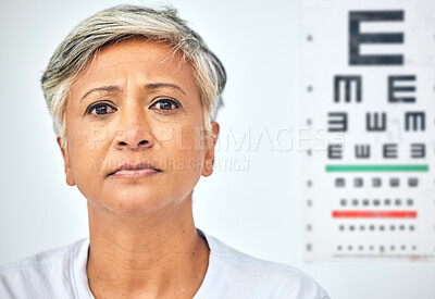 Buy stock photo Senior woman, patient and serious portrait and vision test at healthcare, hospital and clinic. Medical exam, elderly female person and face with appointment and ready for prescription for eye care