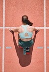 Start, running and fitness with woman on race track from above for sports, competition and marathon. Exercise, health and wellness with runner in stadium for challenge, speed and energy performance