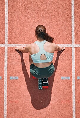 Buy stock photo Start, running and fitness with woman on race track from above for sports, competition and marathon. Exercise, health and wellness with runner in stadium for challenge, speed and energy performance