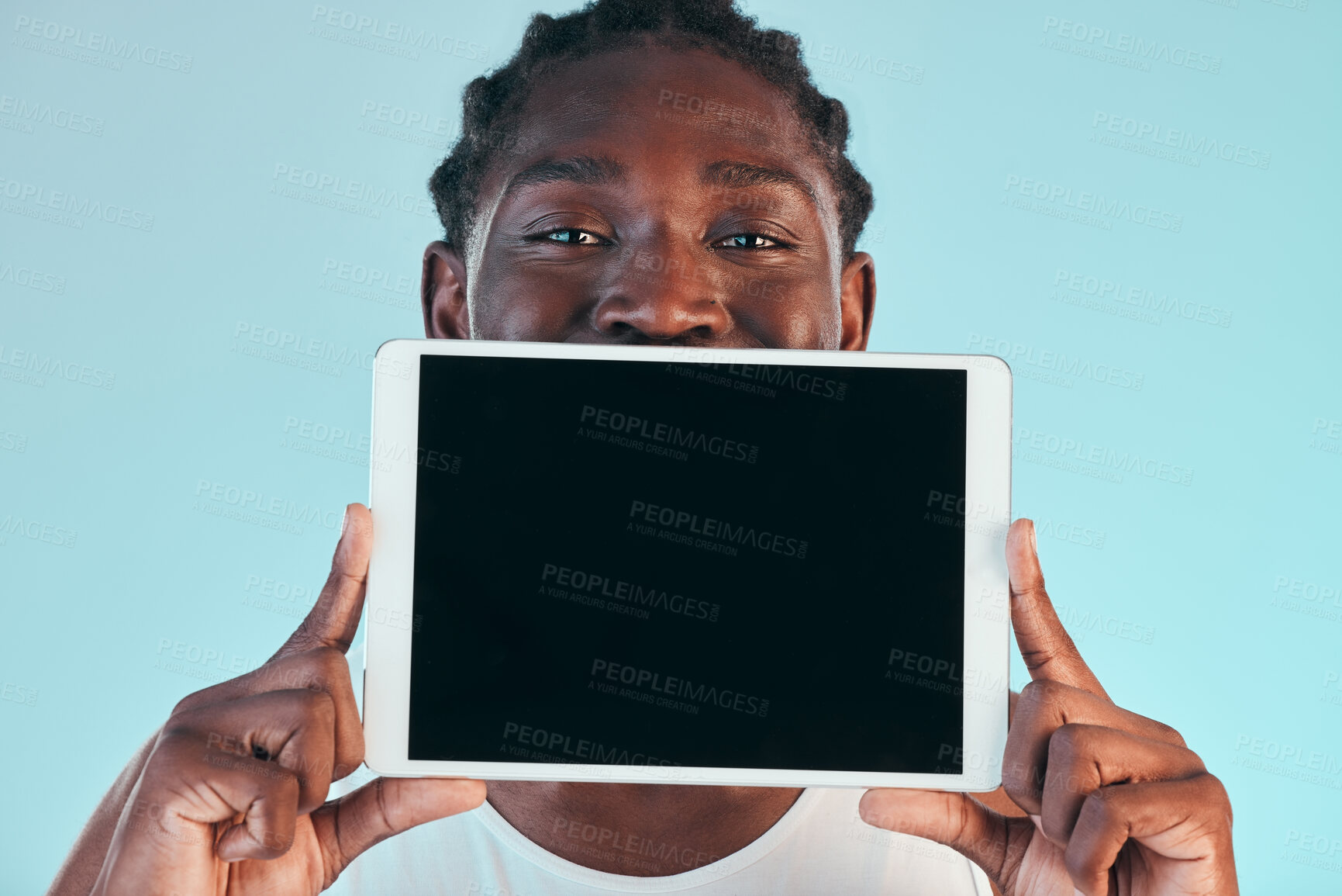 Buy stock photo Tablet, screen and black man with mockup in studio with news, promo or announcement on blue background. Digital, offer and portrait of African male model show space for social media, sign up or deal