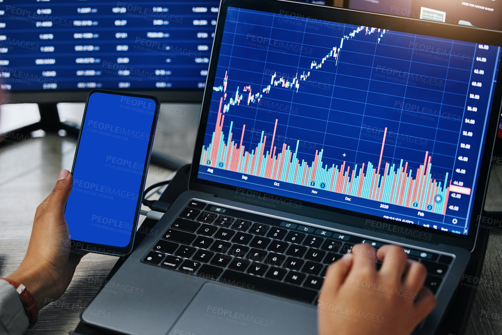 Buy stock photo Hands, laptop and phone screen mockup with data analytics, trading and graph with stock market information. Investment, trader person at desk with tech and finance statistics, dashboard and analysis
