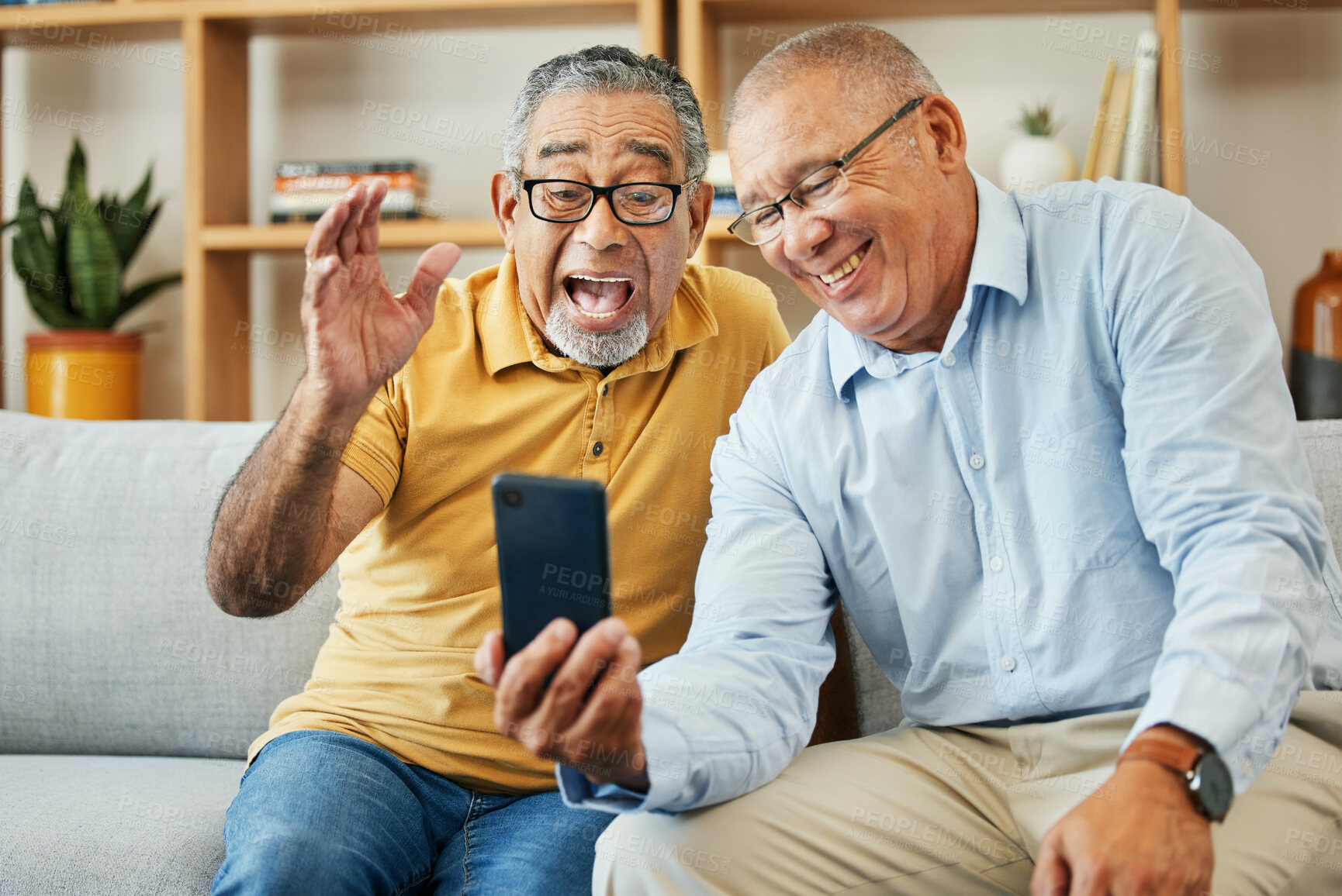 Buy stock photo Friends, video call and senior men on sofa smile for talking, profile picture and chat at home. Retirement, wave and mature people on smartphone for internet, social media and bonding in living room