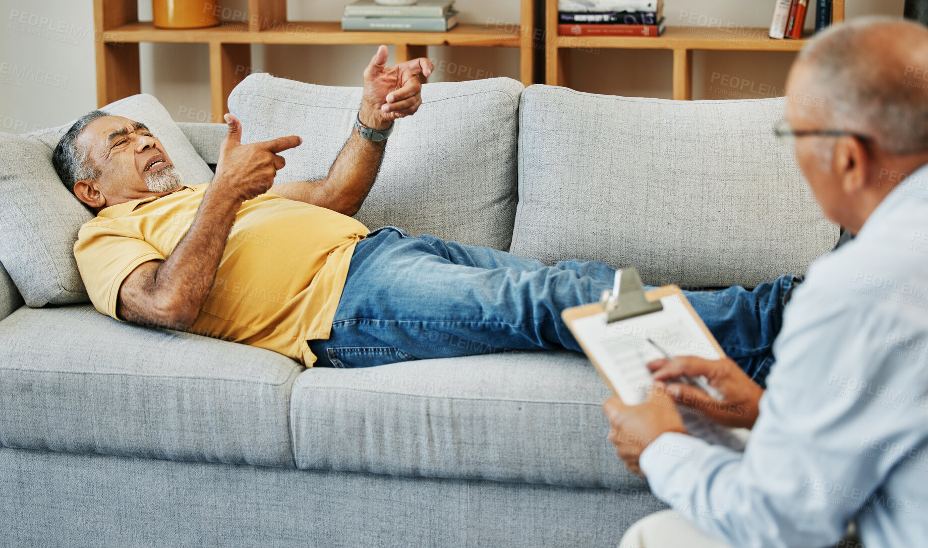 Buy stock photo Old man, psychologist counseling and sofa with trauma stress or mental health, violence or depressed. Elderly veteran, therapist and support or helping advice, talking or anxiety, problem or fear