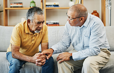 Buy stock photo Men, sofa and support with friends in communication, hand gesture and grief with pain or loneliness. Elderly men, diversity and conversation on mental health or emotional counselling on sad with loss