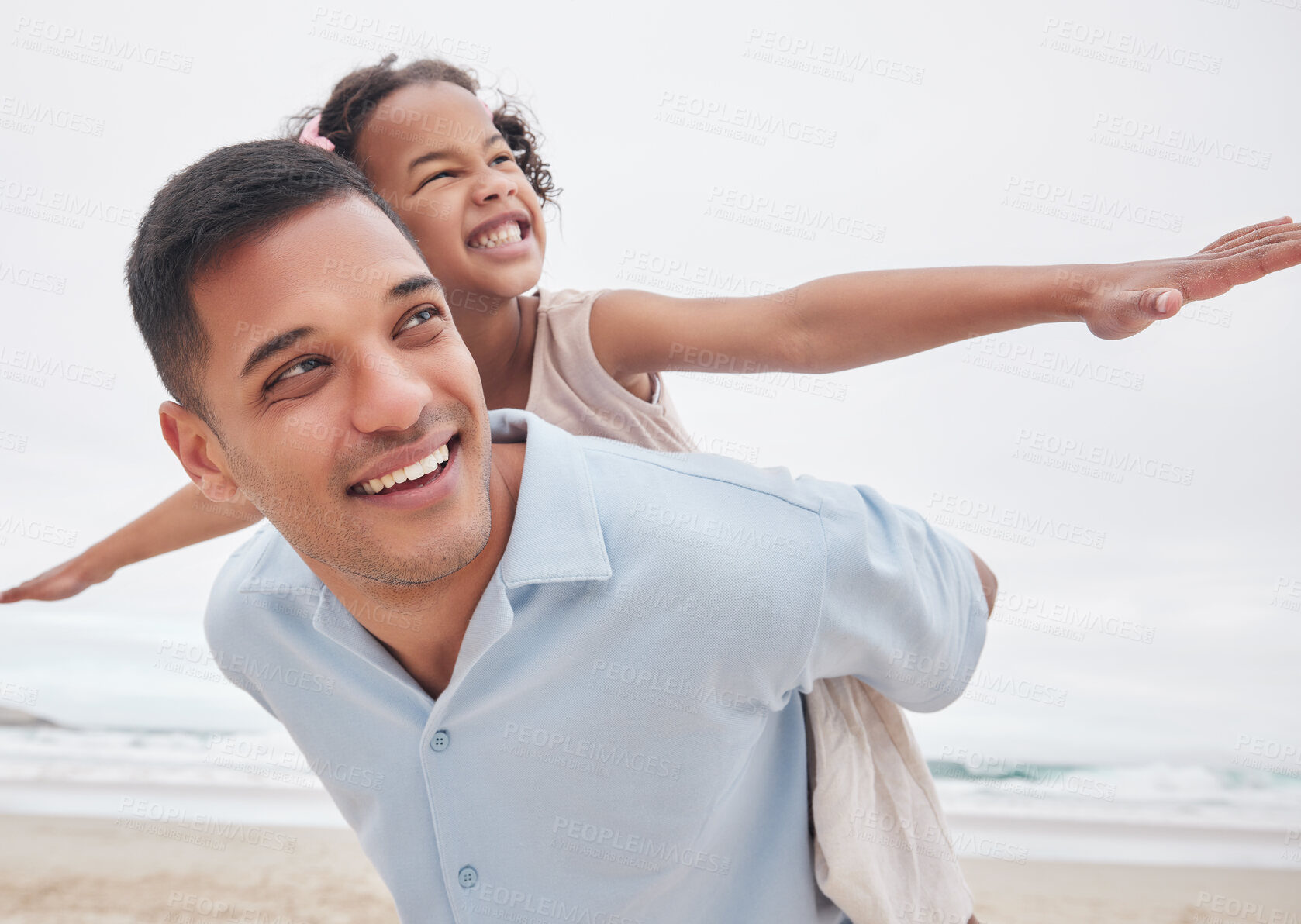 Buy stock photo Beach, fly or happy dad with child in nature to enjoy a family holiday vacation or game in New Zealand. Piggy back, plane or excited father playing at sea with a kid or girl to relax or bond together