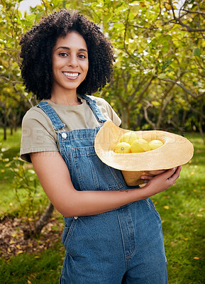 Buy stock photo Happy woman in orchard, portrait and agriculture, lemon in nature with healthy food for nutrition on citrus farm. Farmer, picking fruit and smile with harvest, sustainability and organic product