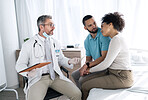 Hospital, doctor and couple consulting for medical service, comfort and empathy for diagnosis news. Healthcare, clinic and person with man and woman holding hands for support, wellness and results