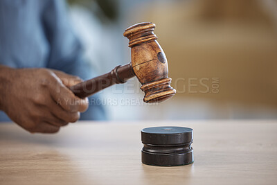 Buy stock photo Gavel, hand of lawyer or judge in office for decision, attention or legal advice in justice system. Hammer, desk and person in courtroom, law firm or government agency to stop hearing in human rights