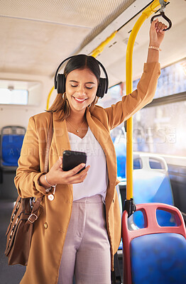 Buy stock photo Woman in bus with smile, phone and headphones, travel on urban commute and streaming podcast on drive. Public transport, service and happy girl listening to music on cellphone for radio on mobile app