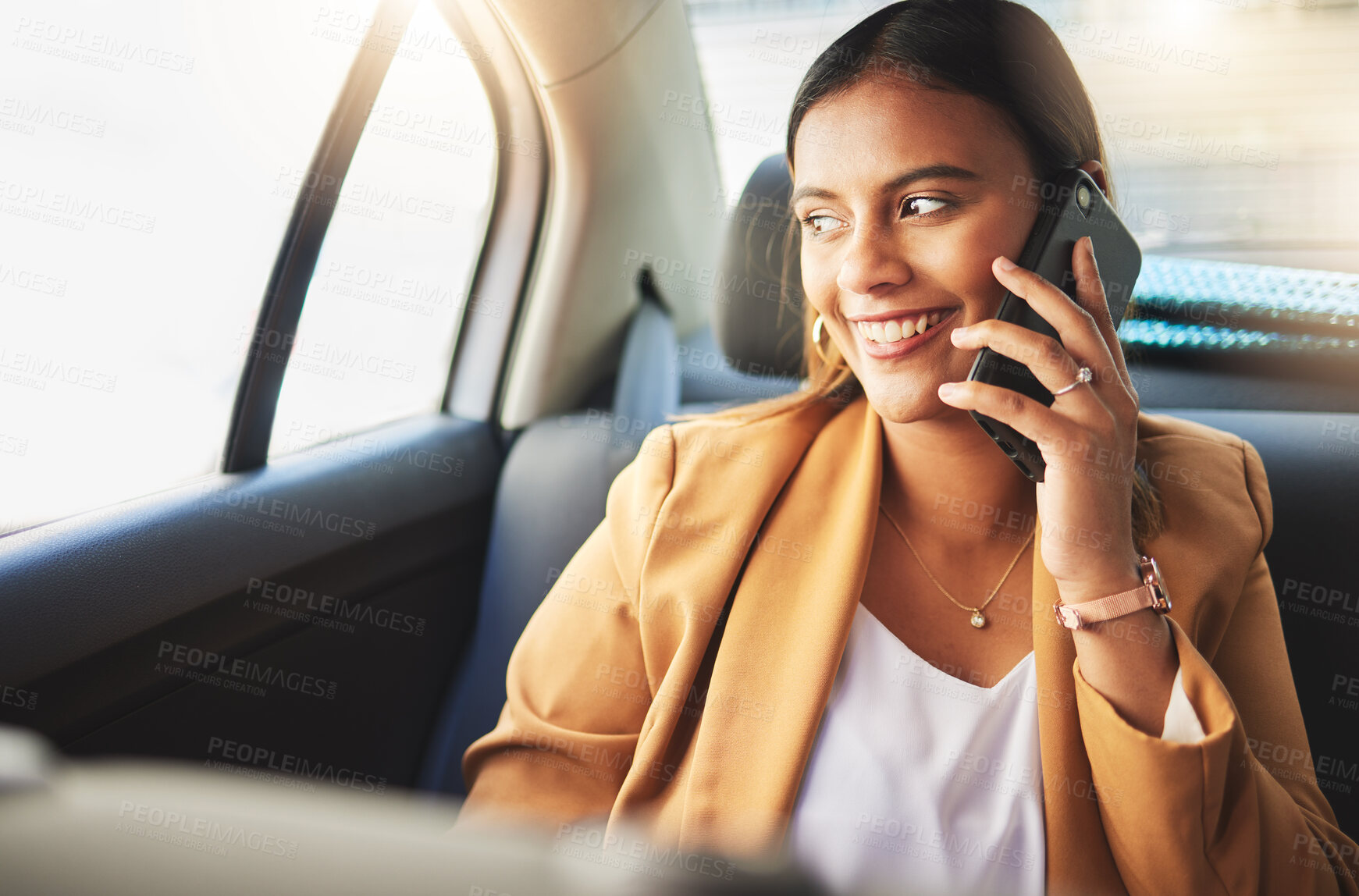 Buy stock photo Woman in taxi with smile, phone call and travel on urban commute in communication on drive. Transport, car or cab ride, girl in happy conversation on cellphone for schedule or agenda on road to work.