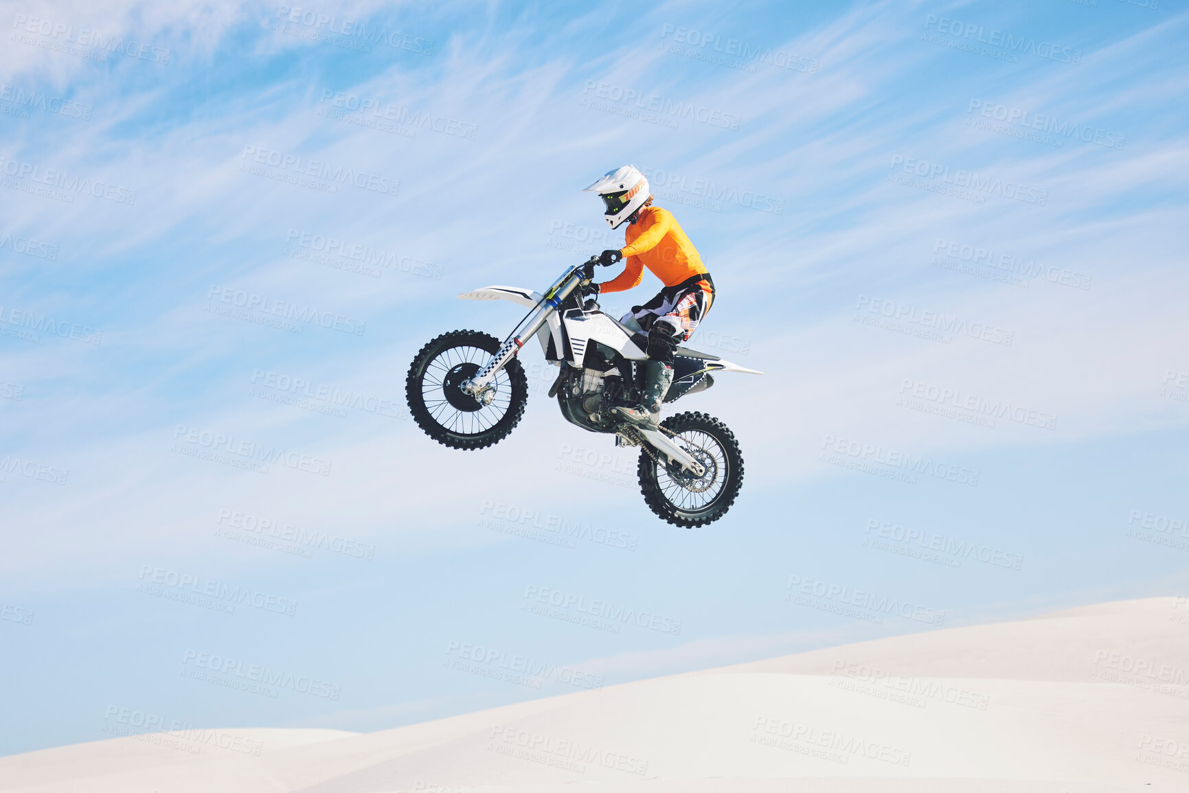 Buy stock photo Motorcycle, jump and man in the air with blue sky, mock up and stunt in sports with fearless person in danger with freedom. Motorbike, jumping and athlete training for challenge or competition
