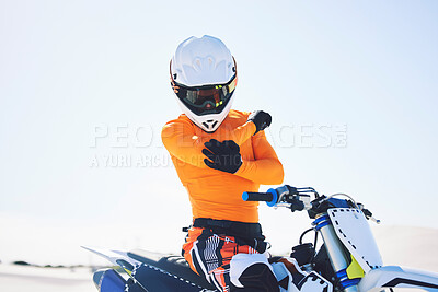 Buy stock photo Moto, person or rider with injury on bike in desert for sports on holiday, vacation or trip in Namibia. Driver, elbow and pain with activity, fearless or fast for fun in summer with, people or race