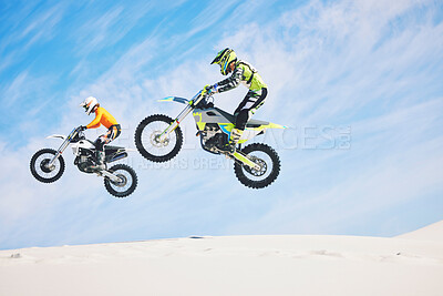 Buy stock photo Jump, people and motorbike with exercise, competition and challenge with safety, fitness and performance. Athletes, sand and bikers with mockup, practice and cycling with freedom, workout and energy