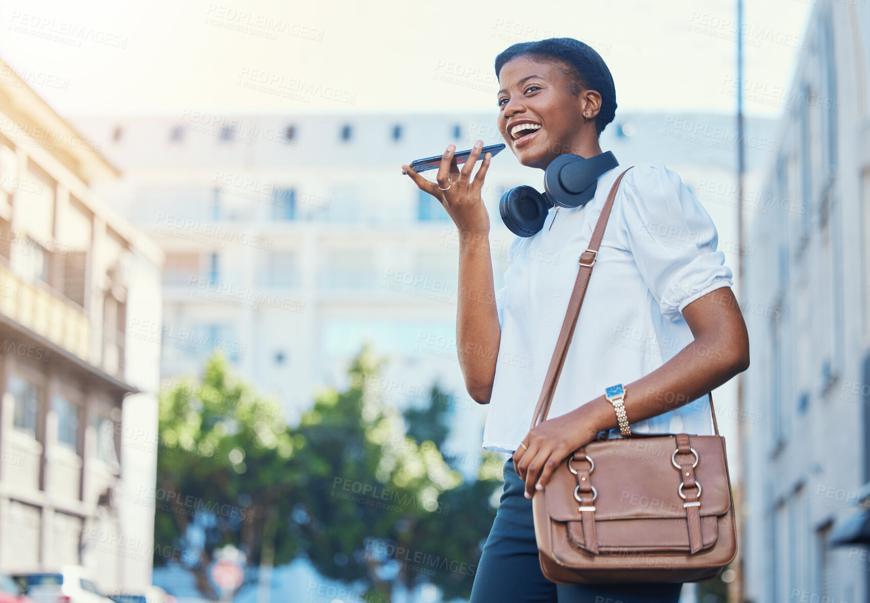 Buy stock photo Phone call, speaker and young woman in city networking for communication, discussion or conversation. Happy, voice recognition and African female person recording message on cellphone walking in town