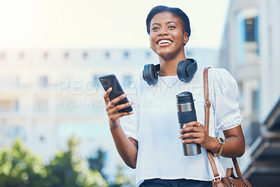 Buy stock photo Cellphone, coffee and young woman in the city networking on social media, mobile app or the internet. Happy, flask and African female person scroll on website with phone walking in urban town street.